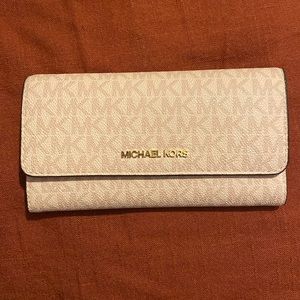 Michael Kors pink multi trifold wallet